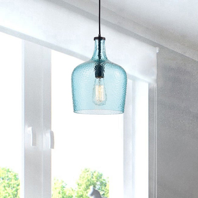 The length of the pendant (from the ceiling plate to the bottom of the glass shade) is 50 inches long