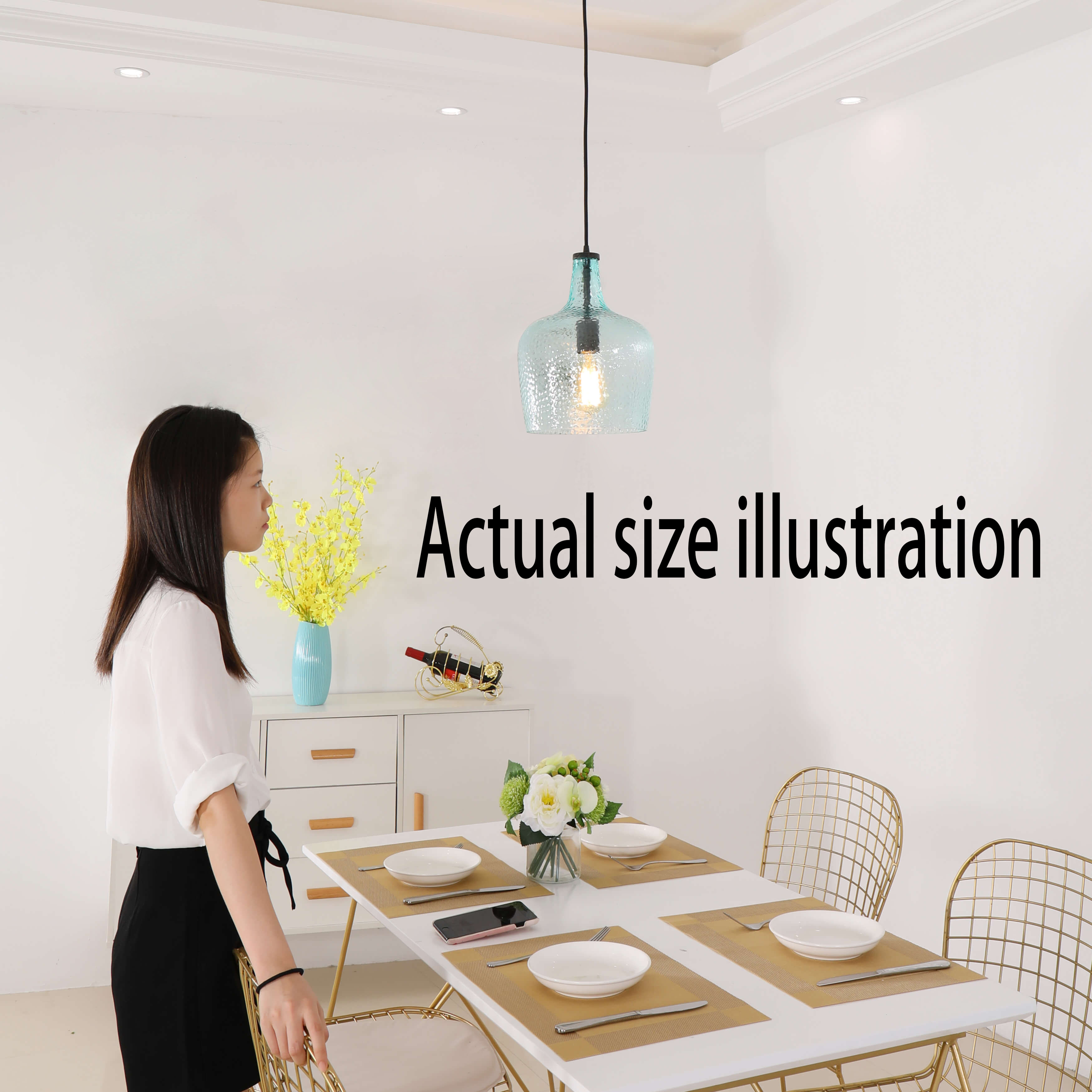 The length of the pendant (from the ceiling plate to the bottom of the glass shade) is 50 inches long
